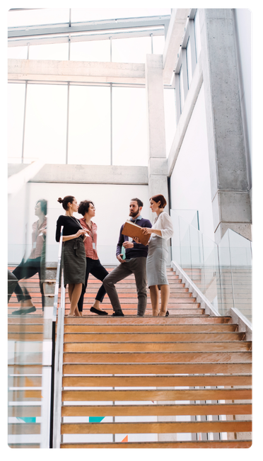 professionals taking on a office staircase