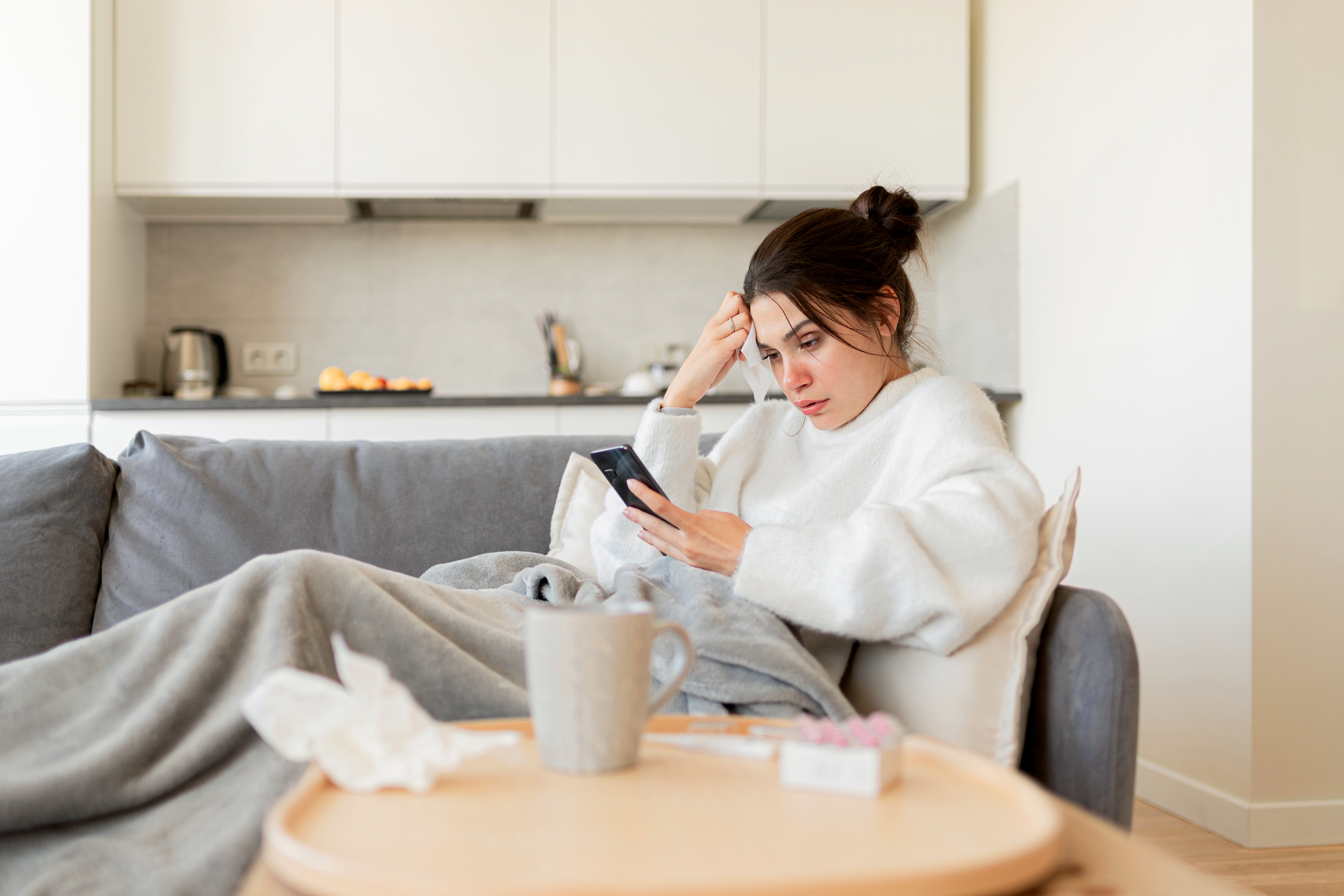 Woman_sick_AdobeStock_560032122